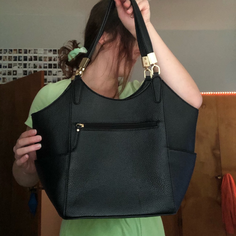 Black leather shoulder bag with gold detailing